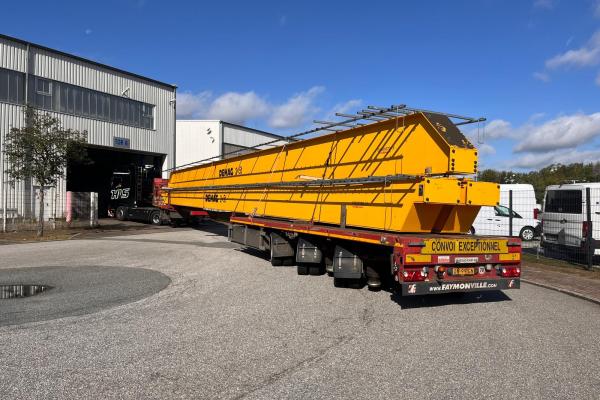 Veilig transport van een Demag ZKKE 5 bovenloopkraan